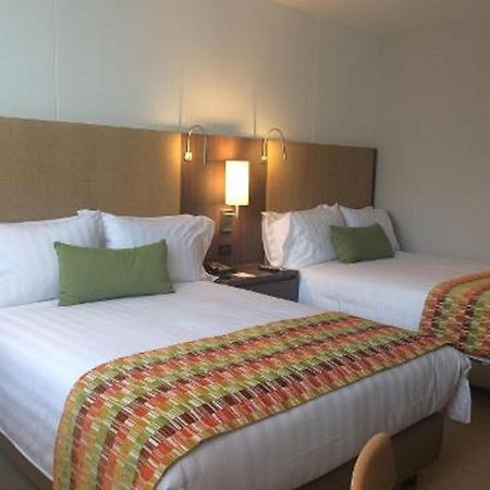 Estelar Villavicencio Hotel & Centro De Convenciones Exterior photo A room at the Hilton Garden Inn in San Francisco